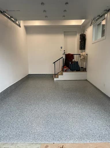 Residential garage epoxy — clean flake finish